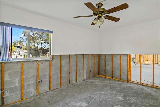 interior space featuring ceiling fan