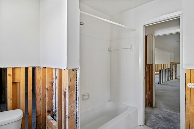 bathroom with shower / bathtub combination and toilet