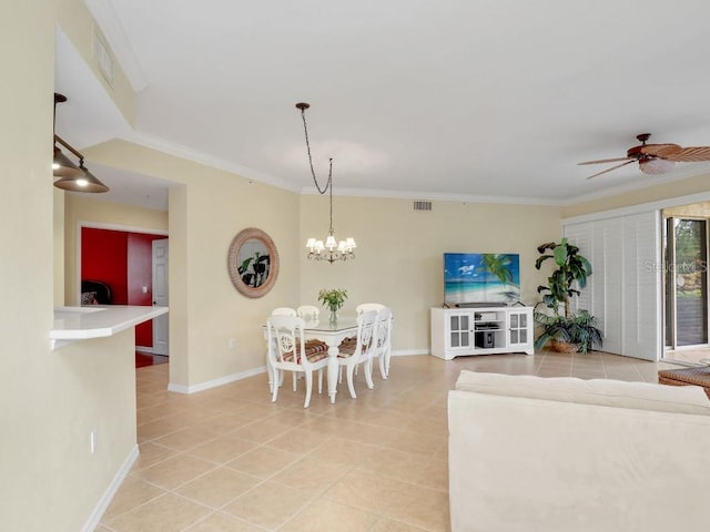 tiled living room featuring ceiling fan with notable chandelier and ornamental molding