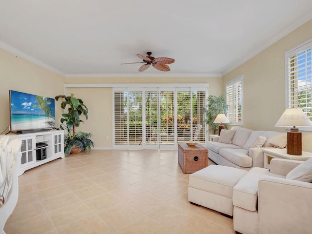 living room with a wealth of natural light, crown molding, and ceiling fan