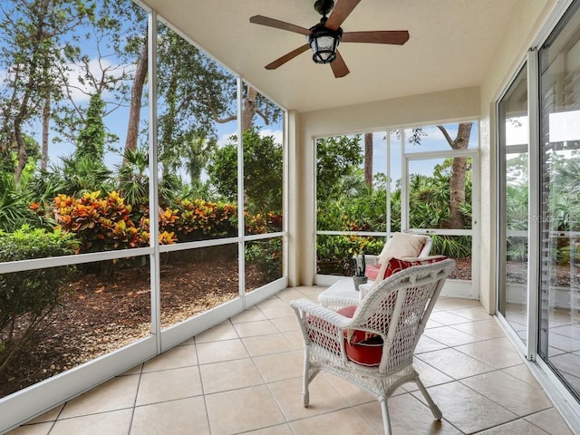 sunroom / solarium with ceiling fan