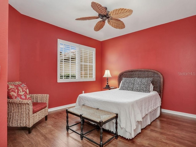 bedroom featuring hardwood / wood-style flooring and ceiling fan