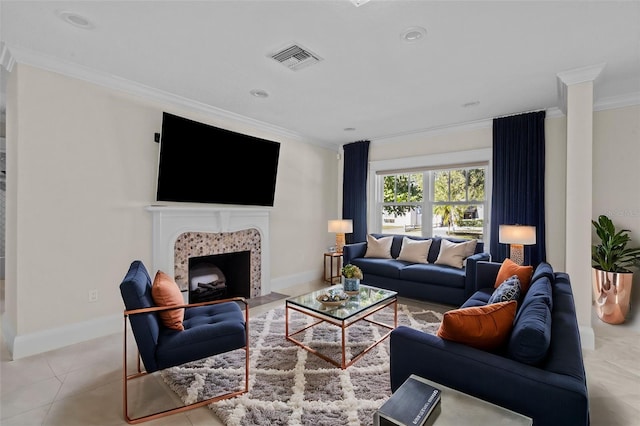 living room featuring ornamental molding and light tile patterned floors