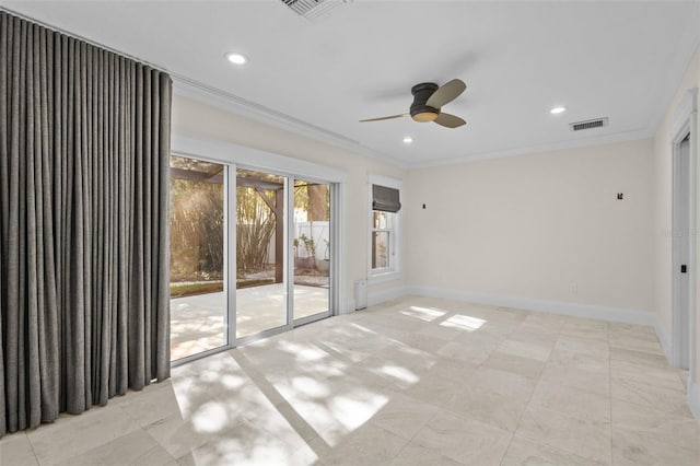 spare room with crown molding and ceiling fan