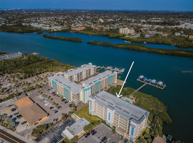 birds eye view of property featuring a water view