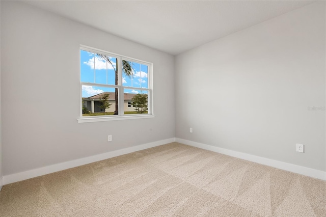 view of carpeted spare room