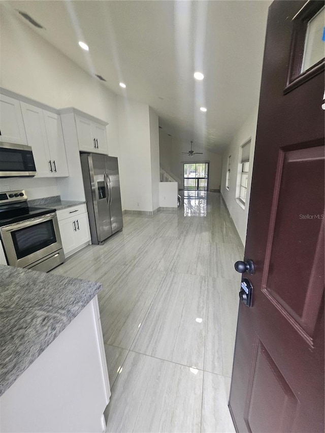 5802 Mohr Loop Unit 5802-5804-5806-5808, Tampa, FL 33615 - kitchen featuring stainless steel appliances, a ceiling fan, white cabinets, recessed lighting, and open floor plan