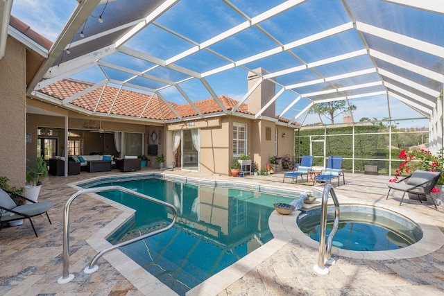 view of pool with a pool with connected hot tub, glass enclosure, a patio, and an outdoor living space