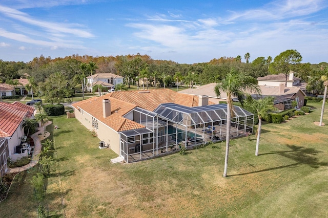 birds eye view of property with a residential view