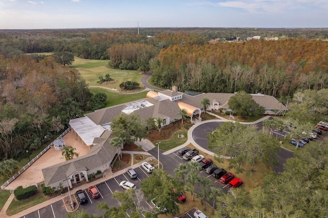 aerial view featuring a view of trees