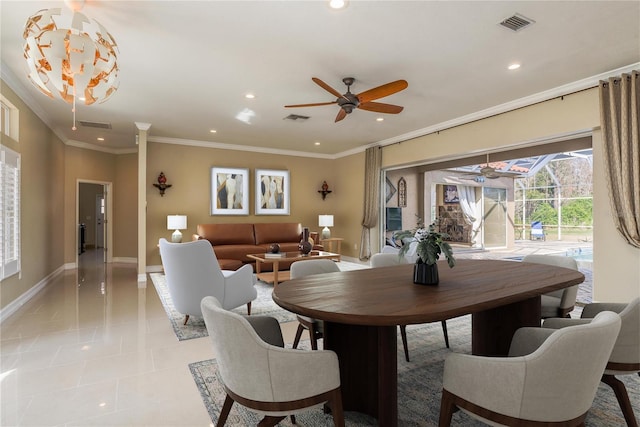 dining room featuring baseboards, visible vents, crown molding, and recessed lighting