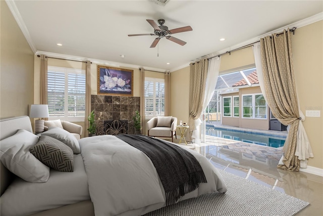 bedroom featuring access to outside, recessed lighting, a tile fireplace, and crown molding