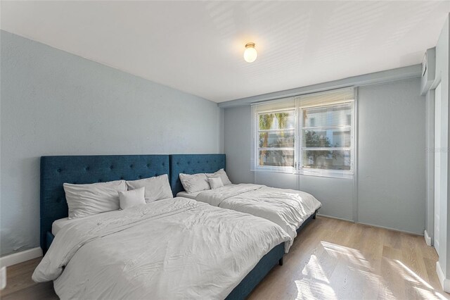 3315 58th Ave S Unit 210, Saint Petersburg, FL 33712 - bedroom featuring light wood finished floors