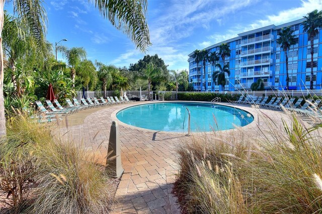 3315 58th Ave S Unit 210, Saint Petersburg, FL 33712 - community pool with a patio