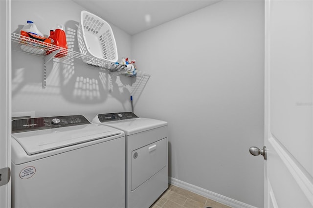 clothes washing area featuring washing machine and dryer