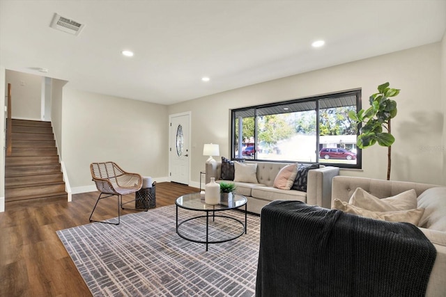 living room with dark hardwood / wood-style floors