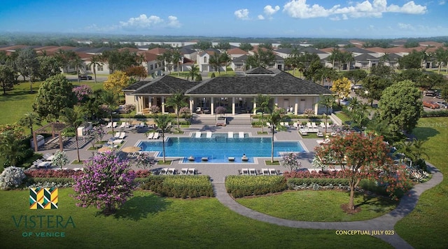 view of swimming pool with a yard and a patio