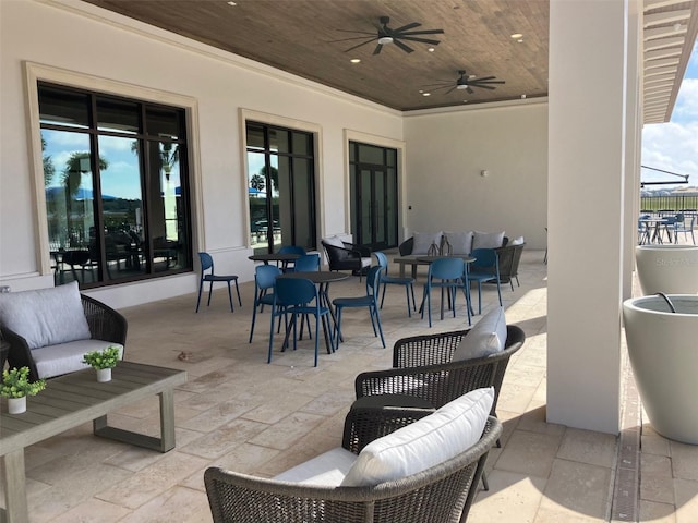 view of patio with ceiling fan