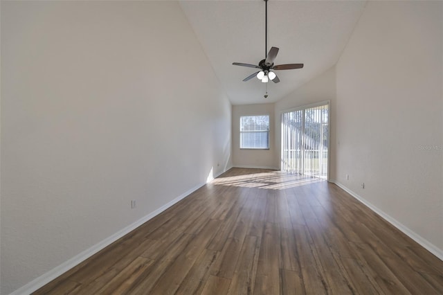 spare room with ceiling fan, high vaulted ceiling, and dark hardwood / wood-style floors