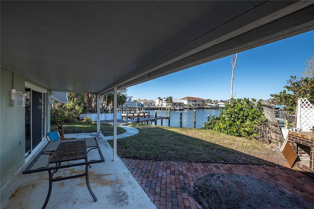 view of patio featuring a water view