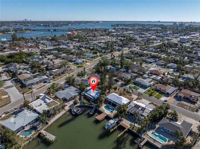 birds eye view of property featuring a water view