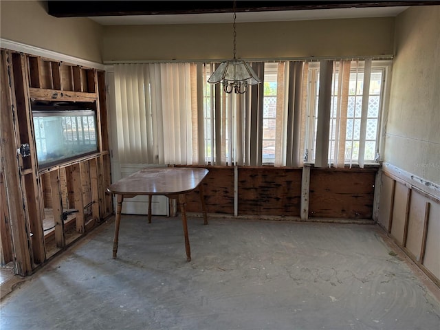 505 80th Ave, St Pete Beach, FL 33706 - dining room featuring a chandelier