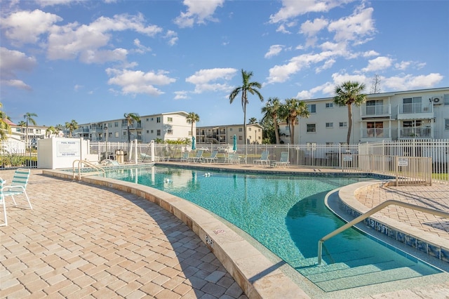 view of pool featuring a patio