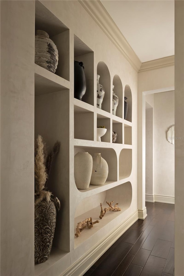 interior details with wood-type flooring and crown molding