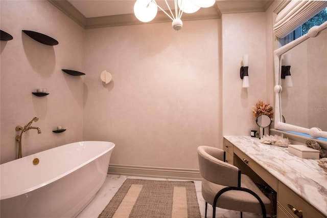 bathroom with ornamental molding, vanity, and a bathing tub