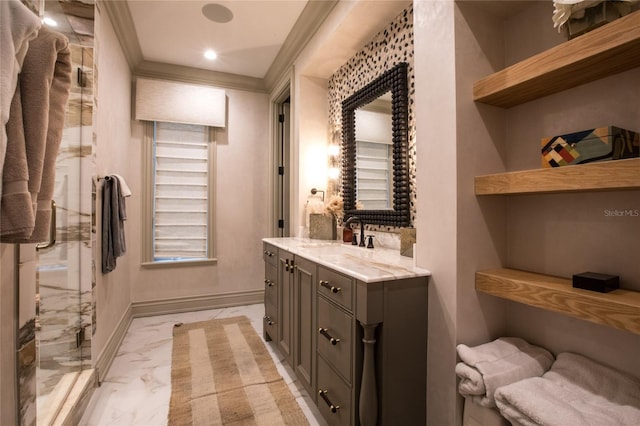 bathroom with crown molding and vanity