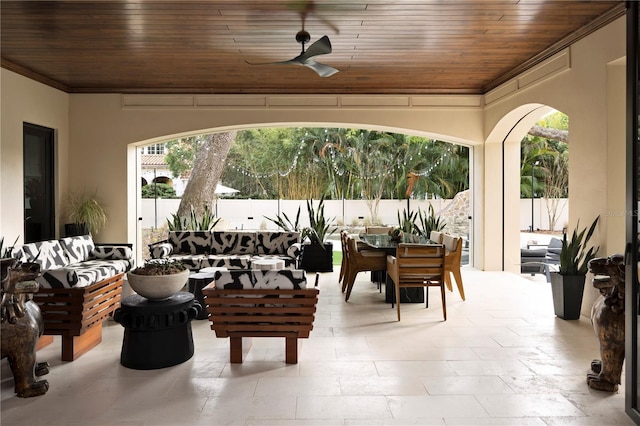 view of patio featuring ceiling fan and an outdoor living space