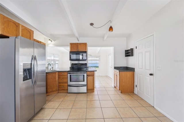 kitchen with beam ceiling, stainless steel appliances, light tile patterned floors, and sink