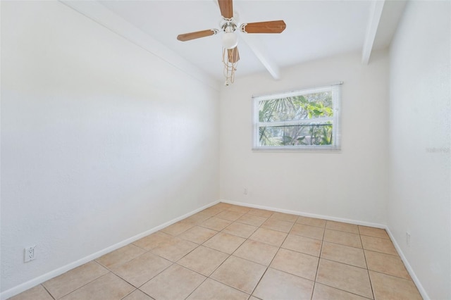 unfurnished room with beam ceiling, light tile patterned floors, and ceiling fan