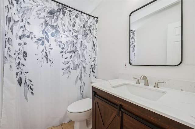 bathroom featuring vanity, tile patterned floors, a shower with curtain, crown molding, and toilet