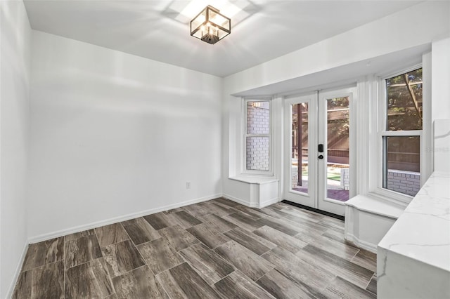 interior space featuring french doors and wood-type flooring