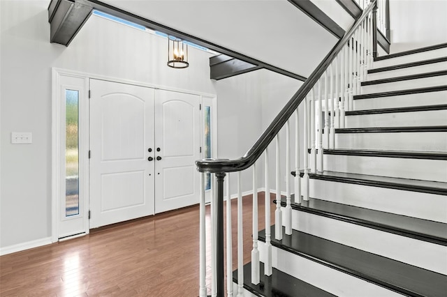 entrance foyer featuring hardwood / wood-style flooring