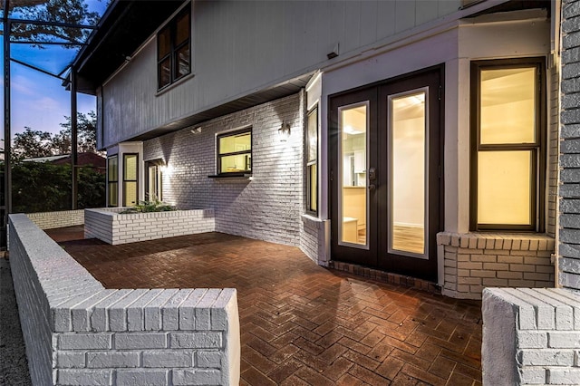 patio terrace at dusk with french doors