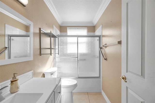 full bathroom with vanity, shower / bath combination with glass door, tile patterned flooring, toilet, and ornamental molding