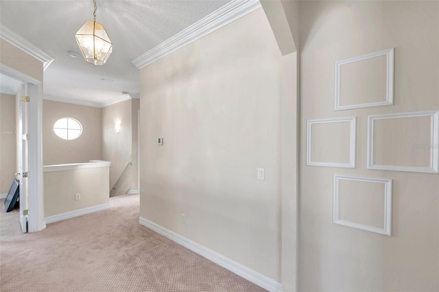 corridor featuring light colored carpet and ornamental molding