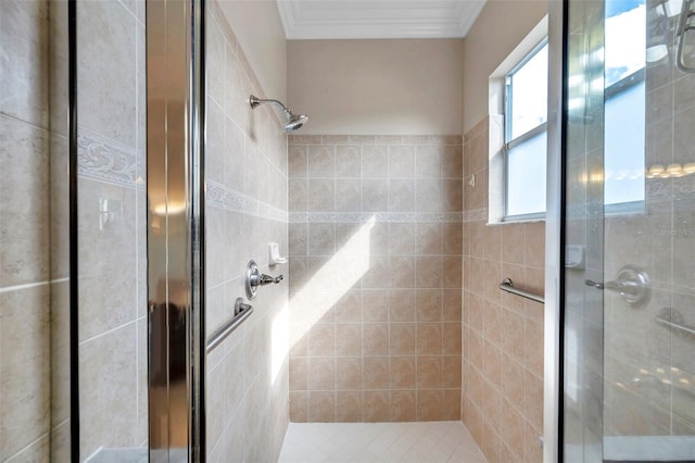 bathroom featuring a shower with shower door