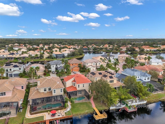 bird's eye view with a water view