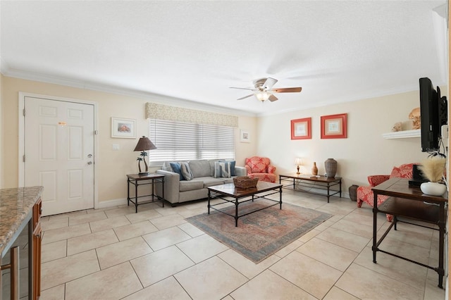 living room featuring crown molding, ceiling fan, and light tile patterned floors