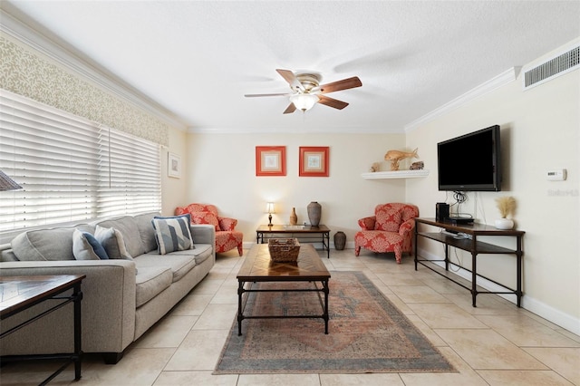 tiled living room featuring crown molding, ceiling fan, and a textured ceiling