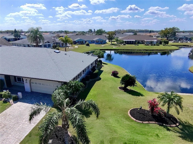 aerial view featuring a water view and a residential view