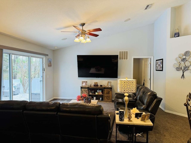 living room featuring carpet flooring, ceiling fan, a textured ceiling, and lofted ceiling