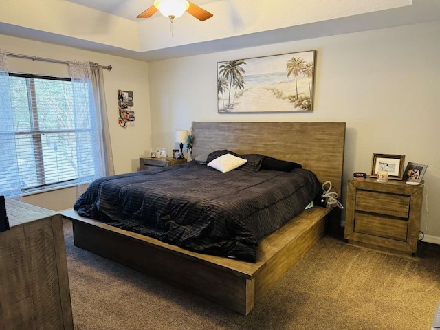 bedroom featuring ceiling fan and carpet floors