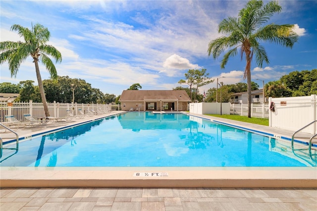 view of swimming pool featuring a patio area