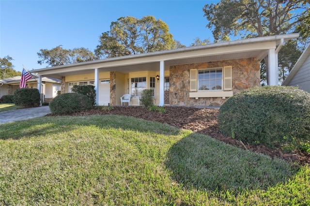 view of front facade with a porch and a front lawn