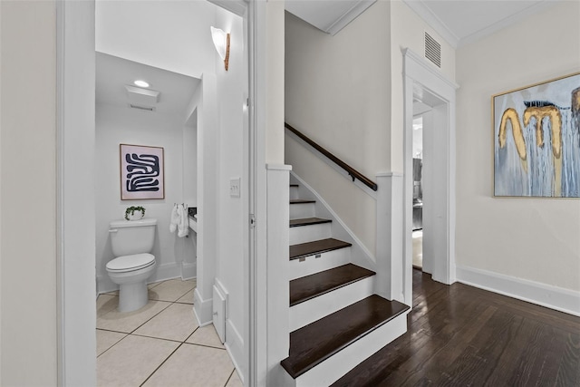 stairway featuring hardwood / wood-style floors