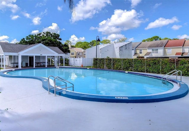 view of swimming pool featuring a patio